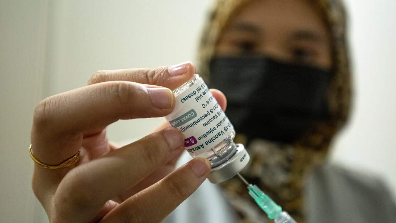 A medical officer prepares a dose of the AstraZeneca's COVID-19 vaccine in Kuala Lumpur, Malaysia, on 16 May, 2021.