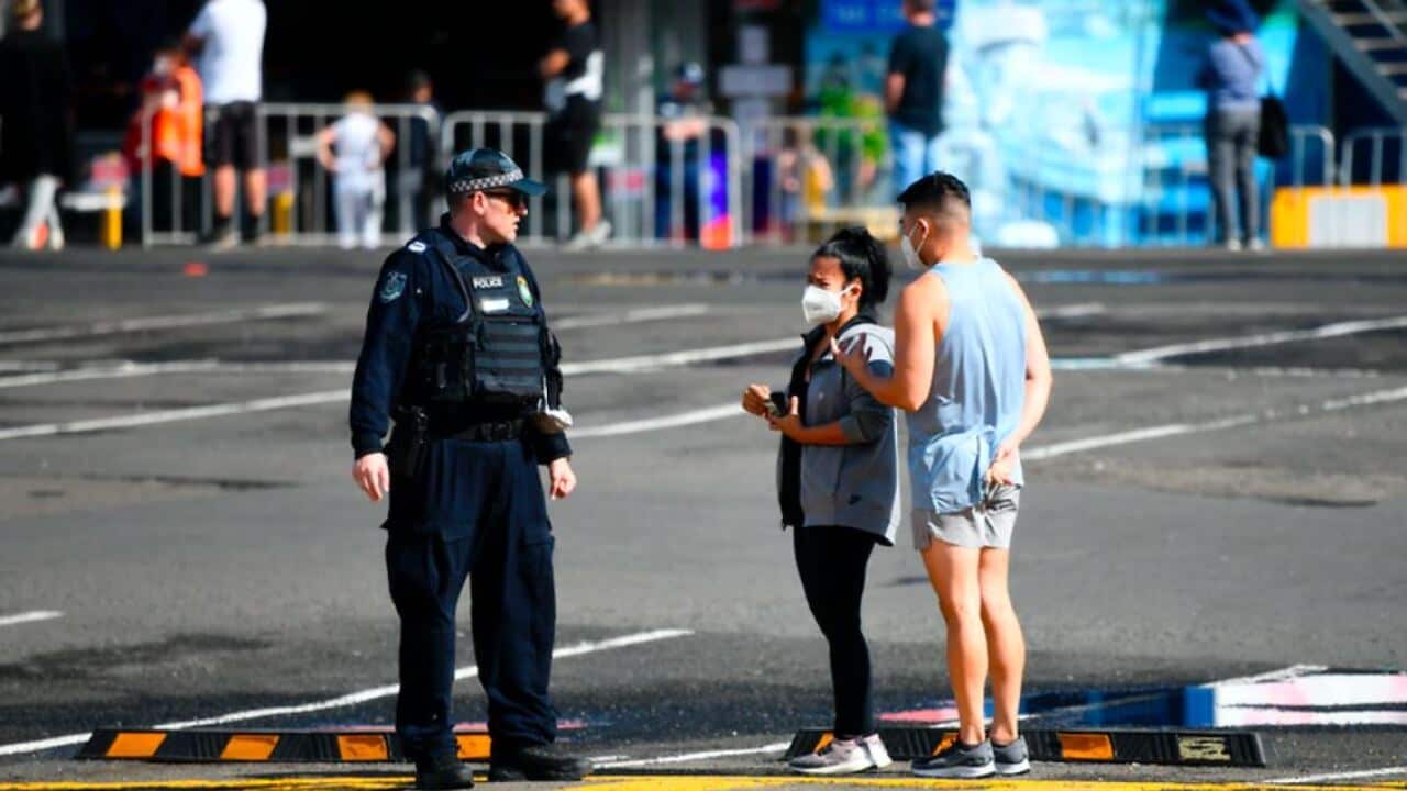 NSW police are seen on patrol as social distancing measures are put in place for Easter Long Weekend trading at the Sydney Fish Market