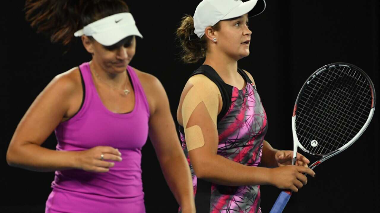 Casey Dellacqua and Ashleigh Barty of Australia