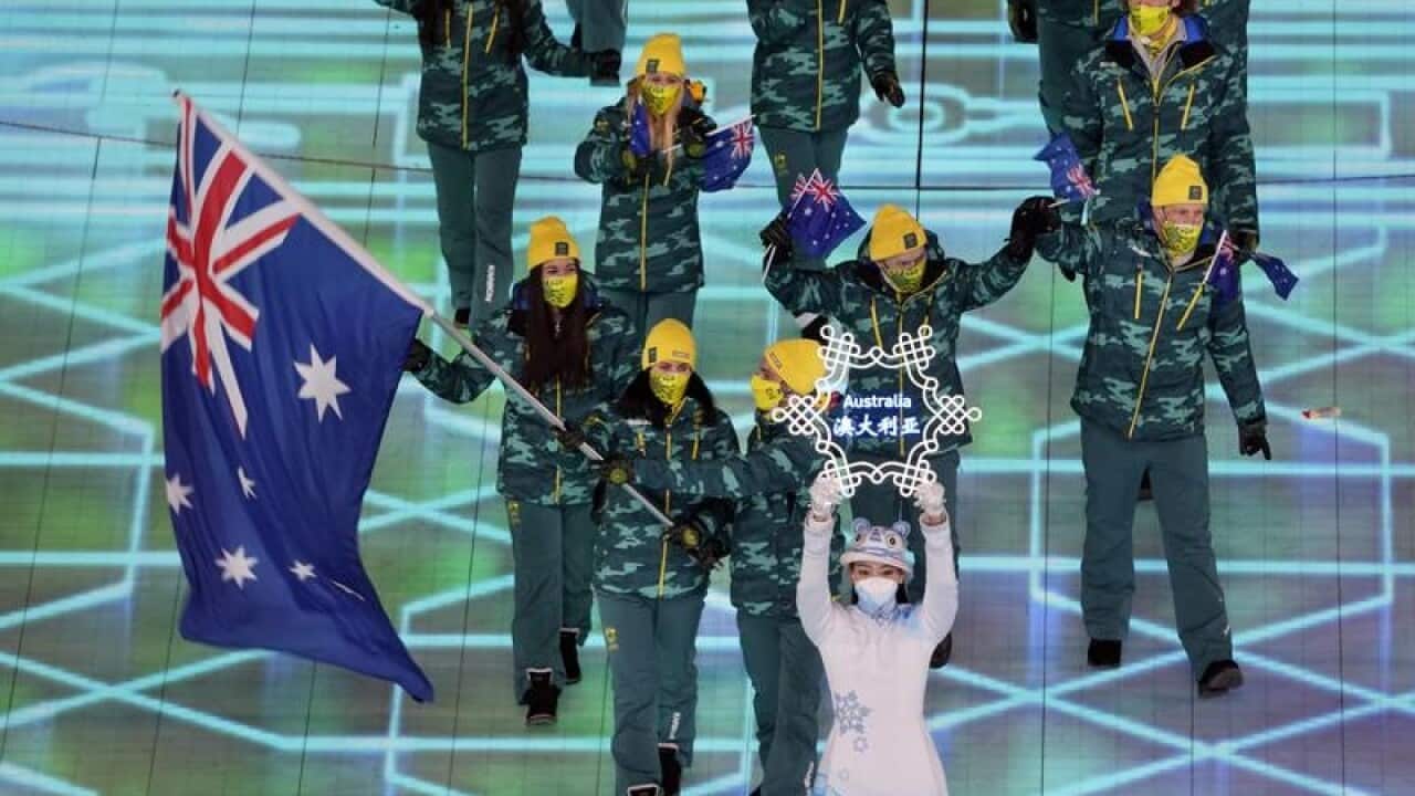 Brendan Kerry and Laura Peel carried the flag as Australia's athletes marched at the Beijing Games.