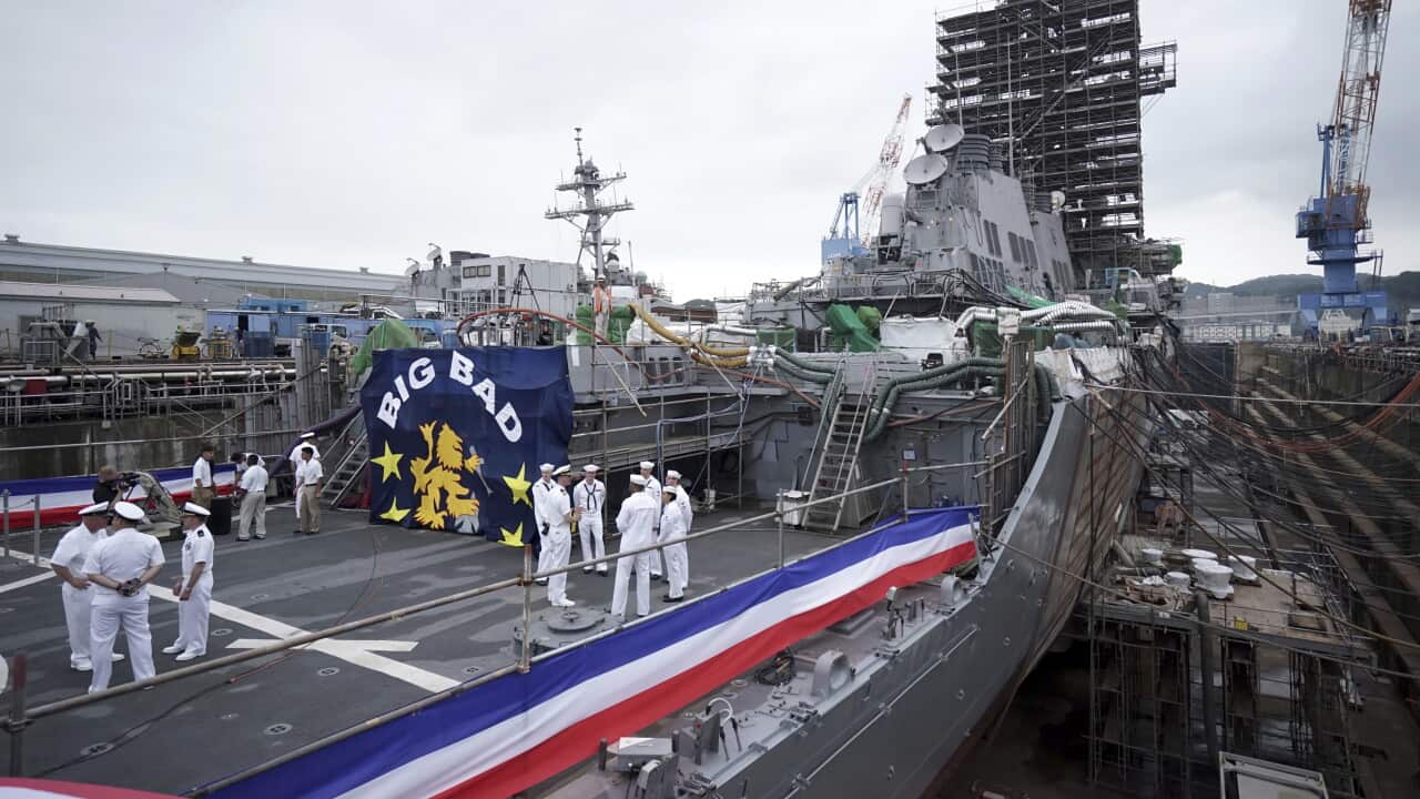 The USS John S. McCain under repair at a dry dock at the U.S. Naval base in Yokosuka, Japan.