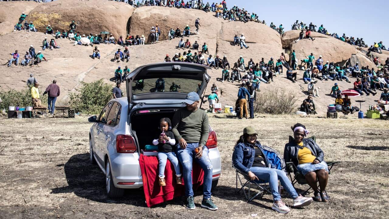 People gather at Marikana during the 10th anniversary of the Marikana massacre