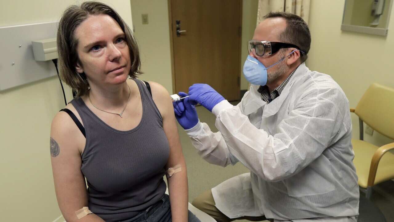 Jennifer Haller is given the first shot in the clinical trial of a potential vaccine for the COVID-19 coronavirus made by biotech firm Moderna in March, 2020.