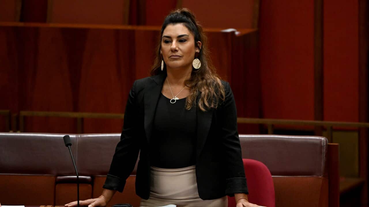 A woman in the Senate chamber at Parliament House