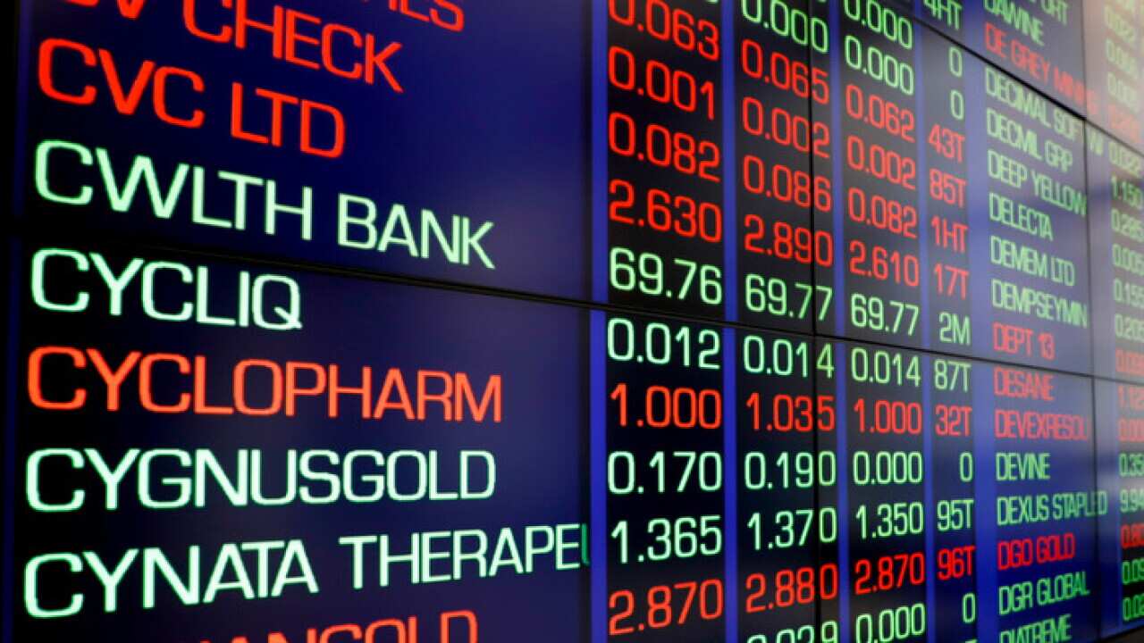Market trading boards in the Australian Securities Exchange (ASX) in Sydney, Monday, June 4, 2018