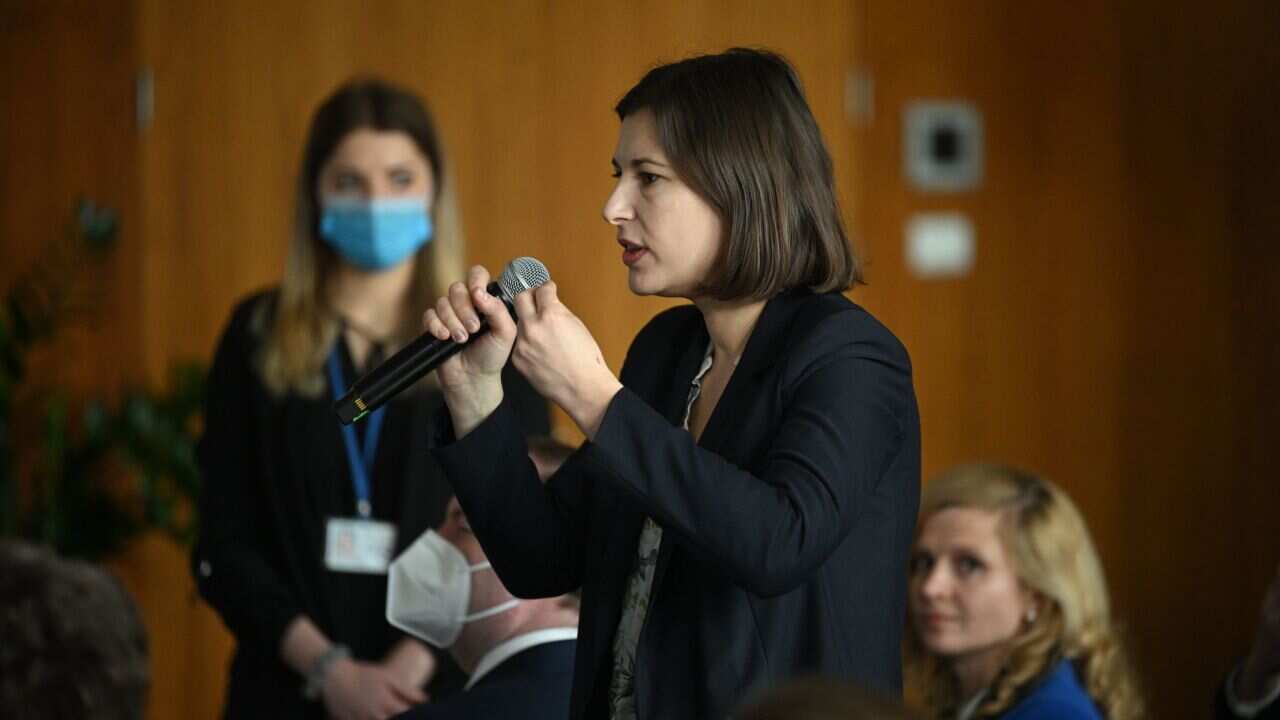Ukrainian journalist Daria Kaleniuk asks a question during a press conference with Britain's Prime Minister Boris Johnson and Polish Prime Minister Mateusz Morawiecki in Warsaw, Poland, 1 March, 2022.