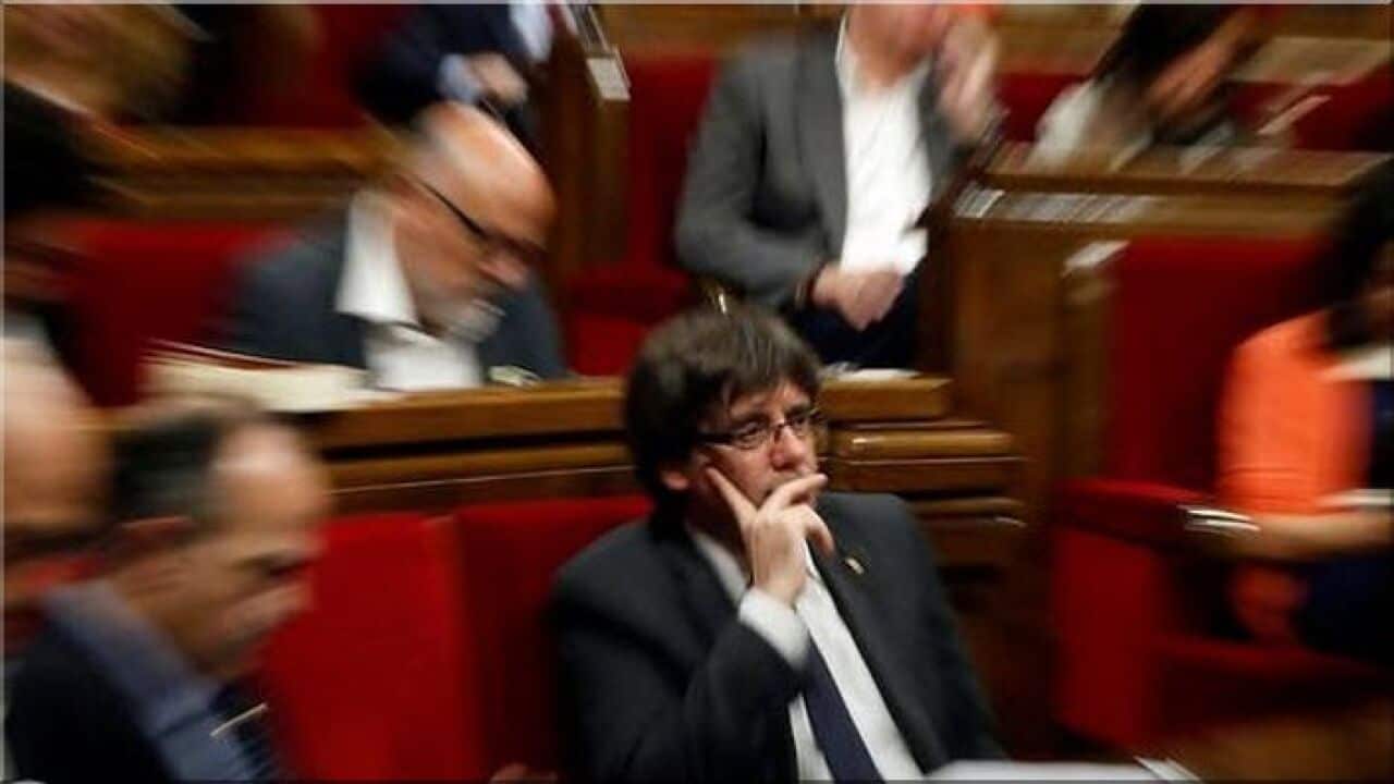 Spain issues arrest warrant for ousted Catalan leader Puigdemont