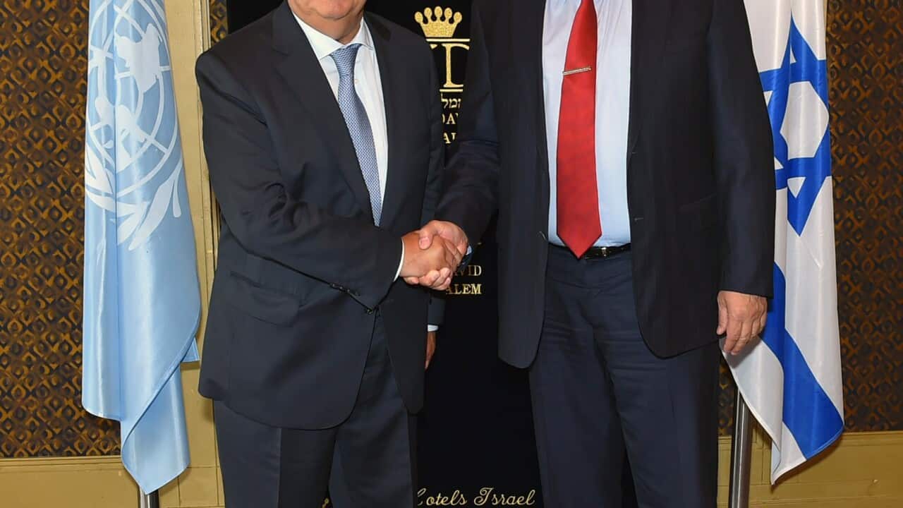 A handout photo made available by the Israeli Ministry of Defense shows UN Secretary General Antonio Guterres (L) and Israeli Defense Minster Avigdor Lieberman