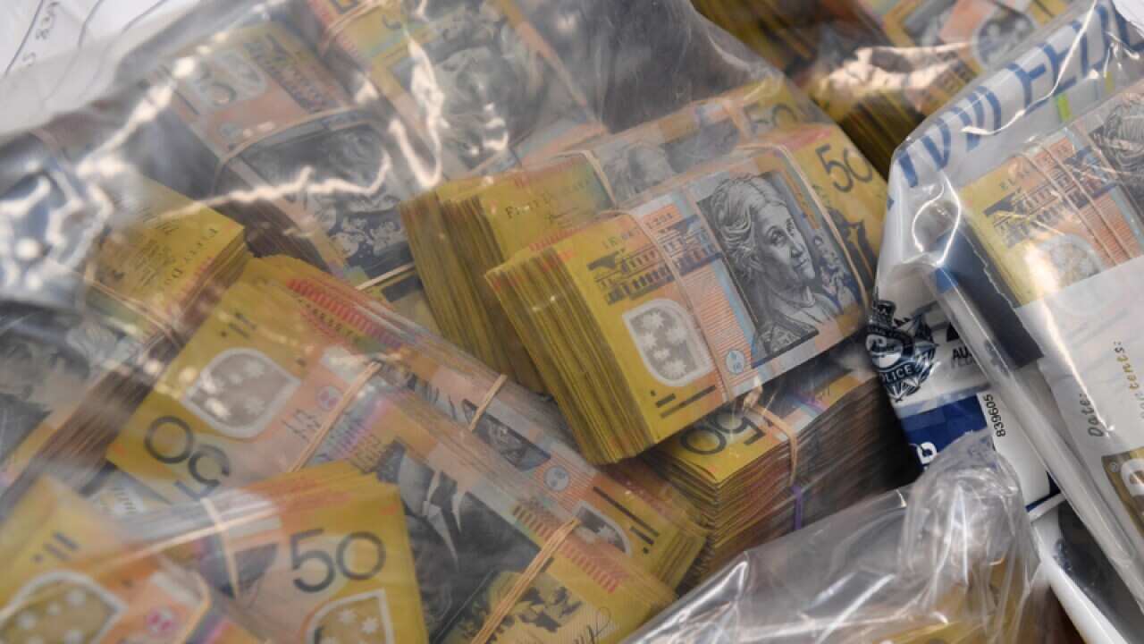 Seized items are displayed at a press conference