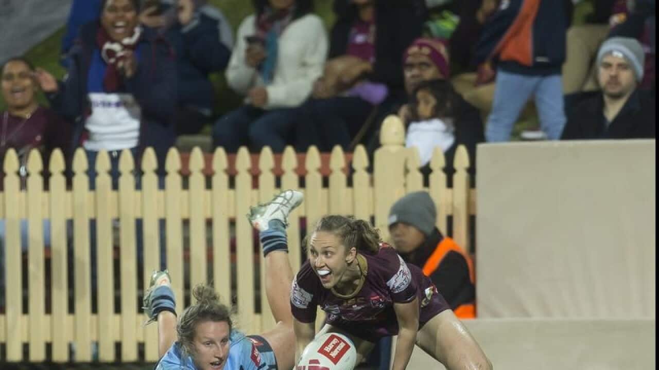 Karina Brown of the Maroons scores against NSW.