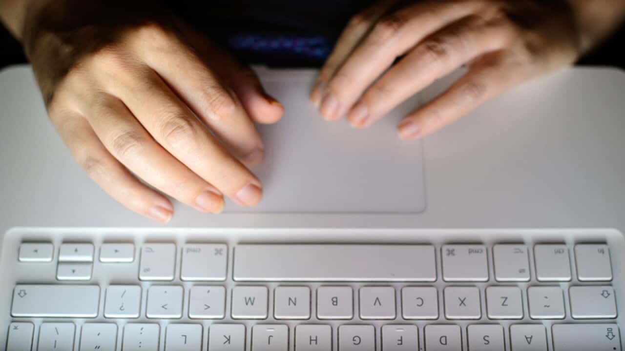 Someone using a laptop