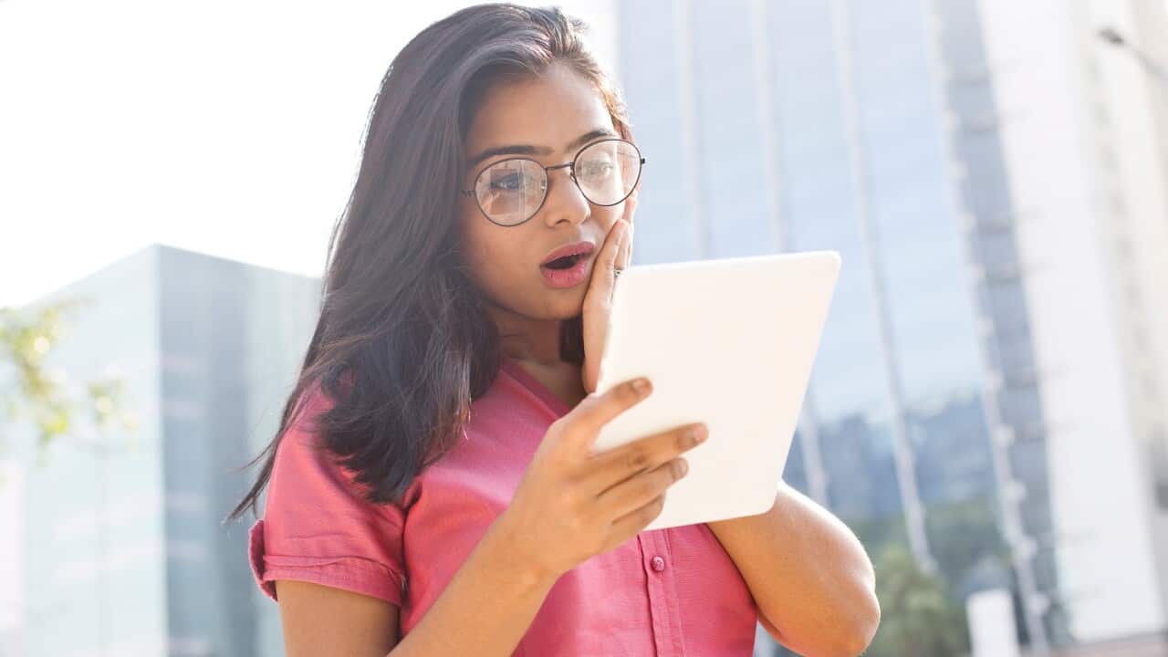Girl looking at Tablet