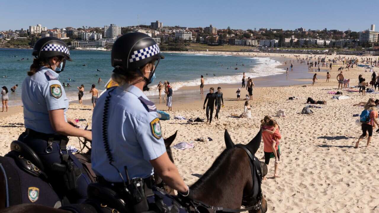 SYDNEY, AUSTRALIA - AUGUST 15: Mounted Police patrol at Bondi Beach as part of public health order compliance operations on August 15, 2021 in Sydney, Australia.