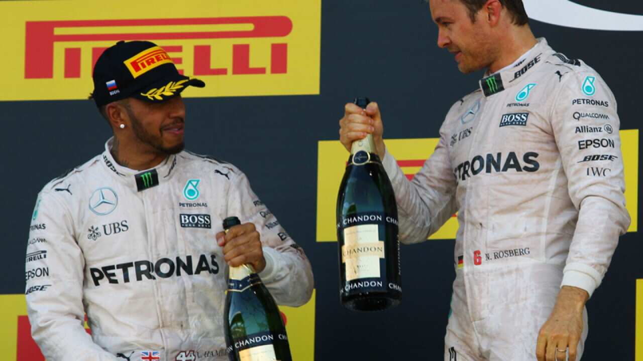 Lewis Hamilton (L) and Nico Rosberg