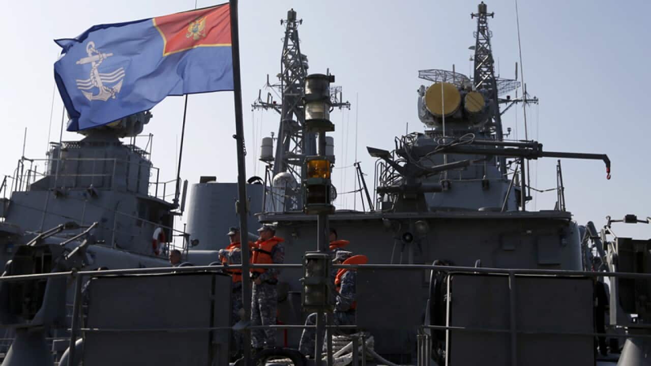 Montenegrin sailors stand at the light frigate "Kotor"
