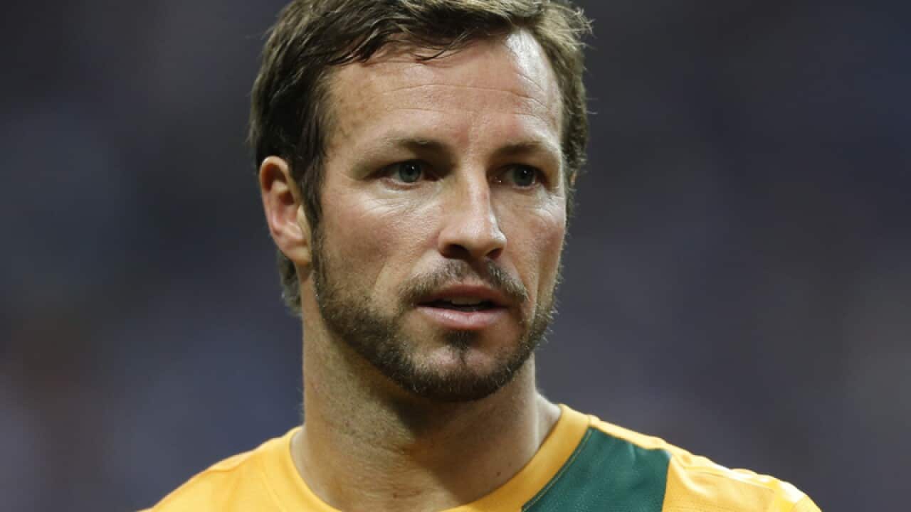 Australia's Lucas Neill in Tokyo