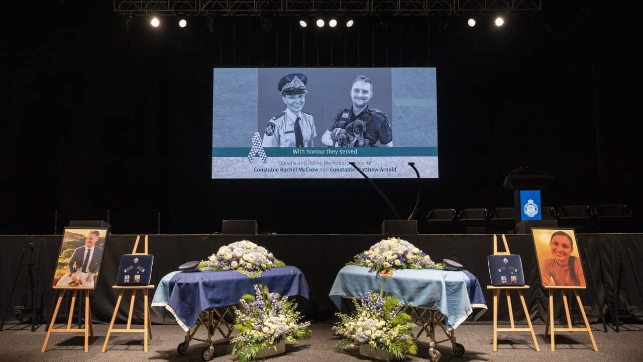 The caskets of Constable Rachel McCrow and Constable Matthew Arnold during the memorial service.