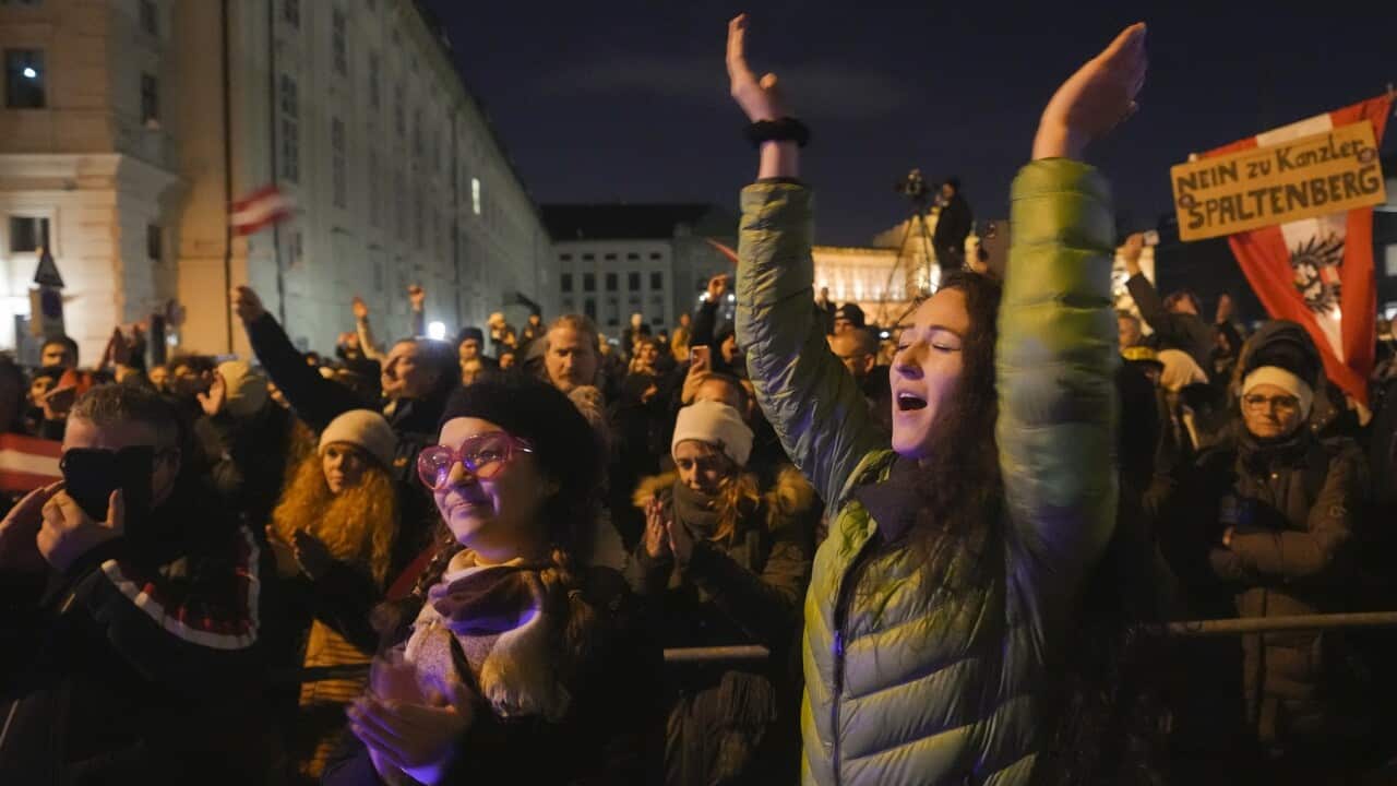 Anti-lockdown protesters shout slogans in Vienna, Austria