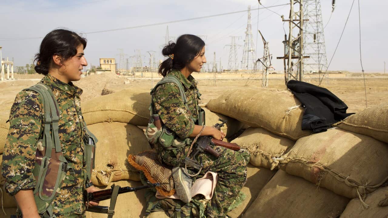 Syria, Rojava: soldier of the People's Protection Units in Hassage