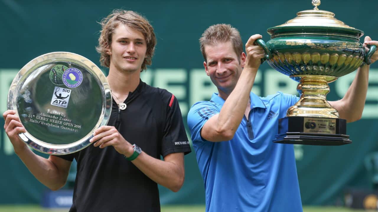 German tennis players Alexander Zverev (l) and winner Florian Mayer