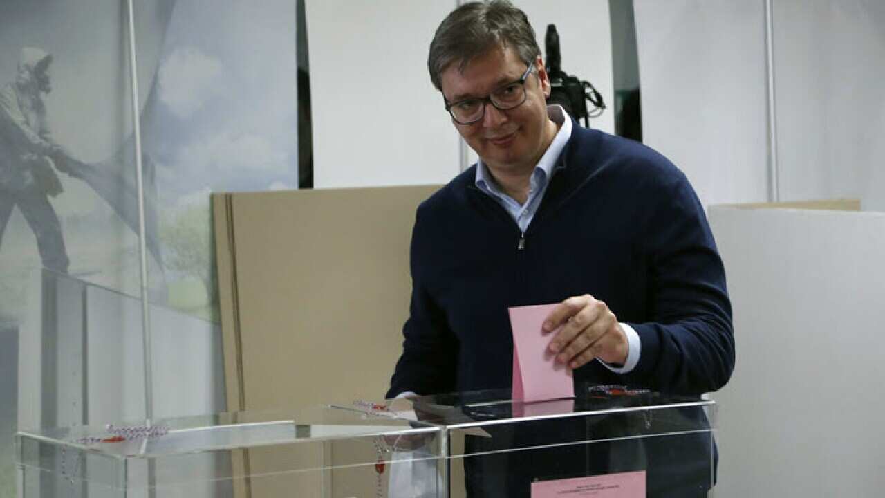 Serbia's President Aleksandar Vucic, casts his ballot at a polling station, in Belgrade, Serbia, Sunday, June 21, 2020.