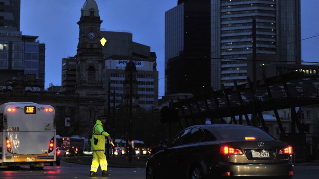 Police direct traffic around the CBD in Adelaide