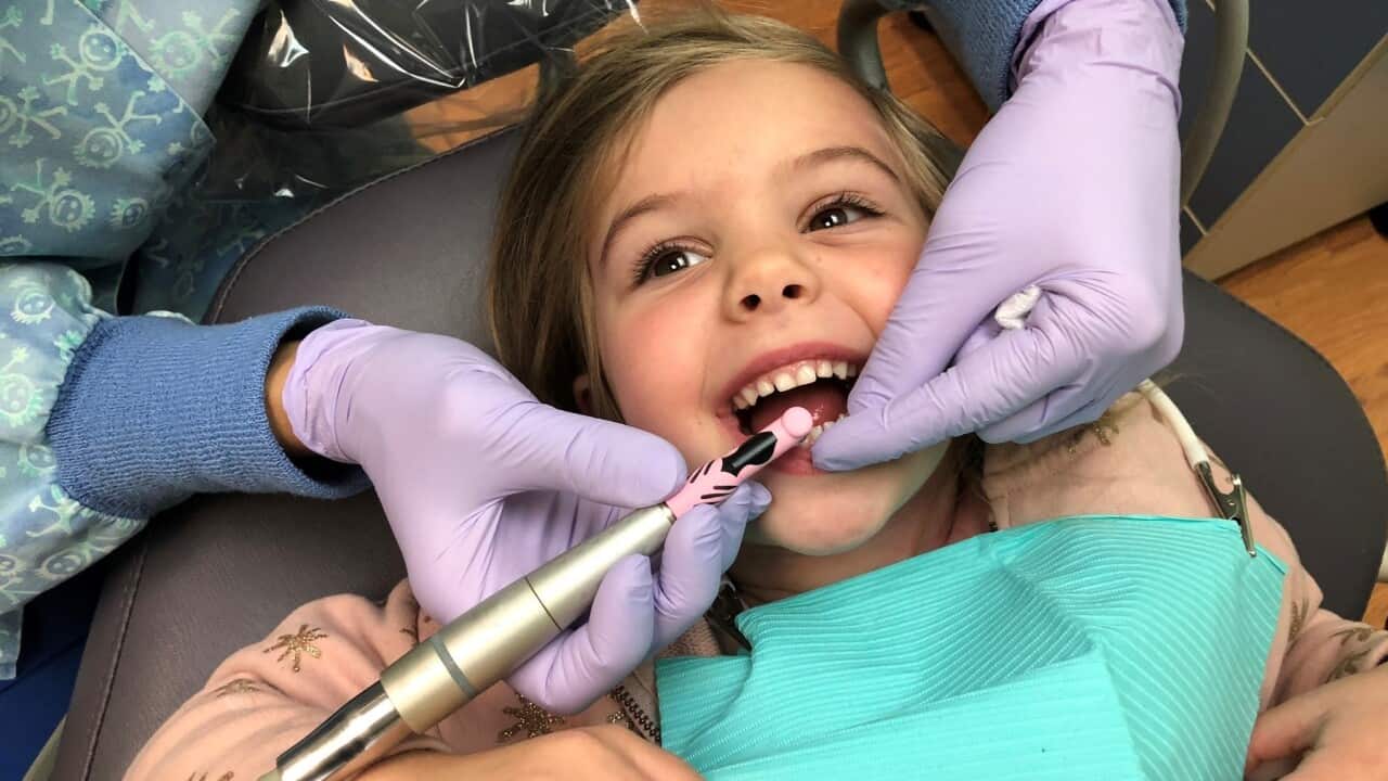 Little girl at the dentist