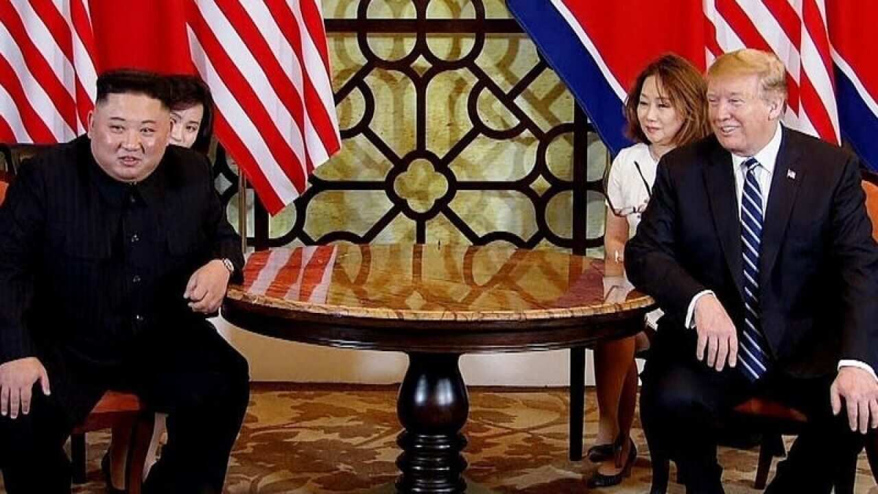 US President Donald Trump (R) and North Korea's Kim Jong-un (L)