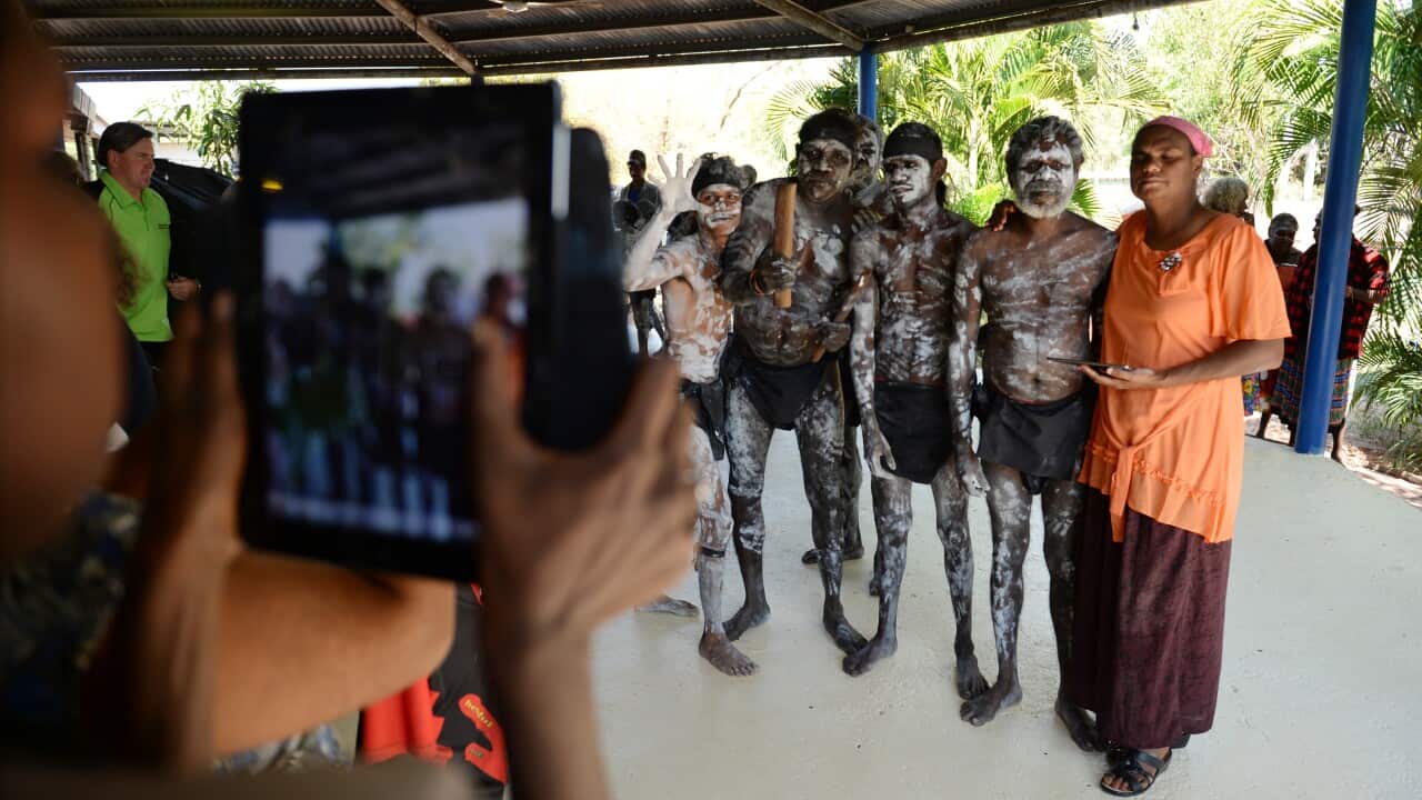 Aboriginal woman with iPad