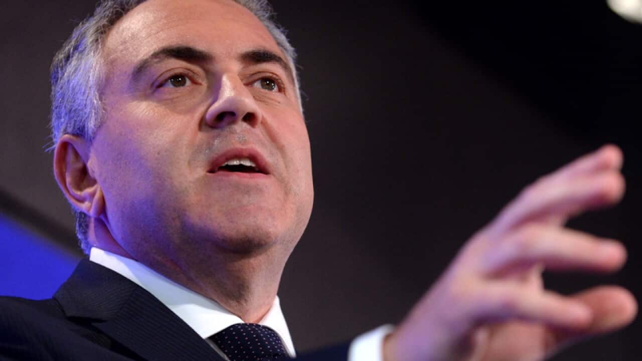 Treasurer Joe Hockey gestures.