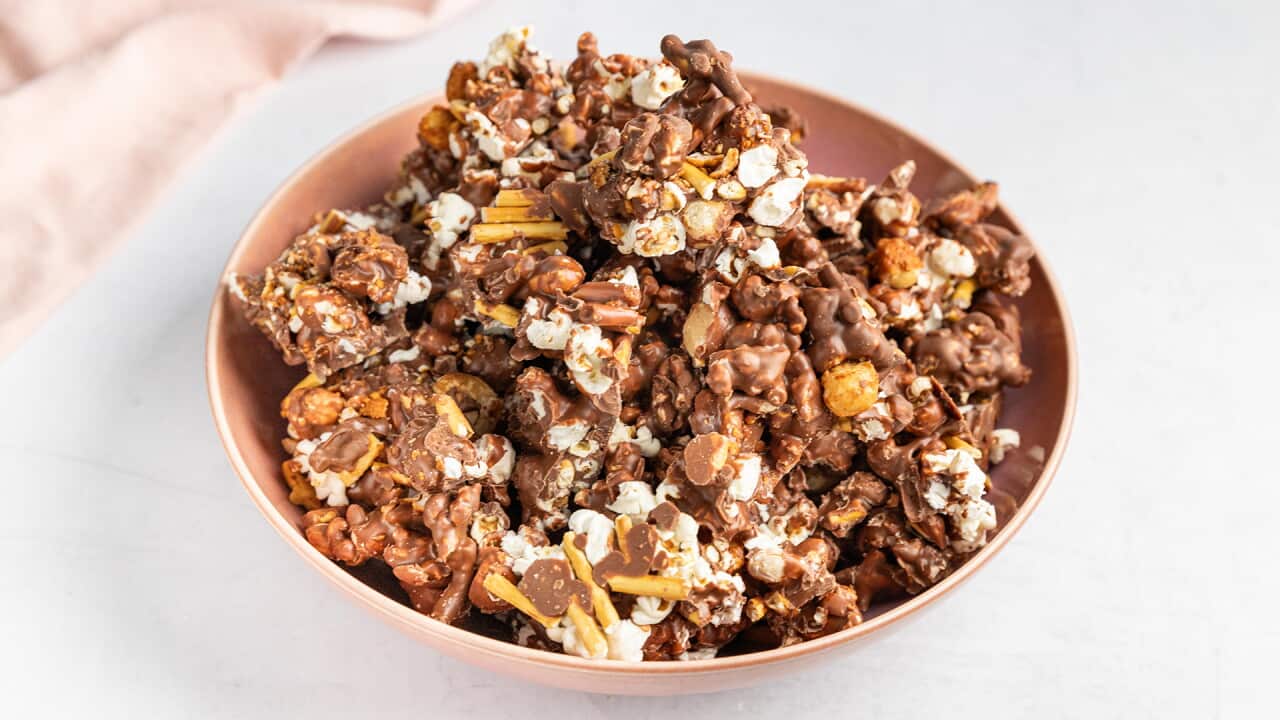 Sweet chilli macadamia bark combines popcorn, pretzels, nuts and chocolate.