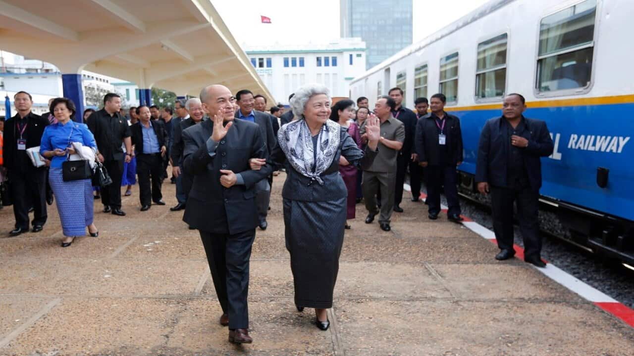 Cambodia has criminalised criticism of King Norodom Sihamoni (left).