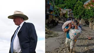 One Nation MP Barnaby Joyce and a man carrying belongings in disaster-hit Nepal