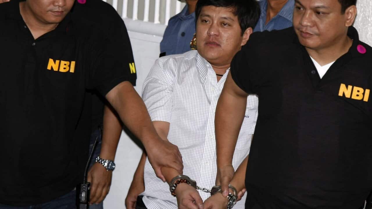 Andal Ampatuan Jr. (C) and his brother Zaldy are among those charged with the massacre in November 2009.