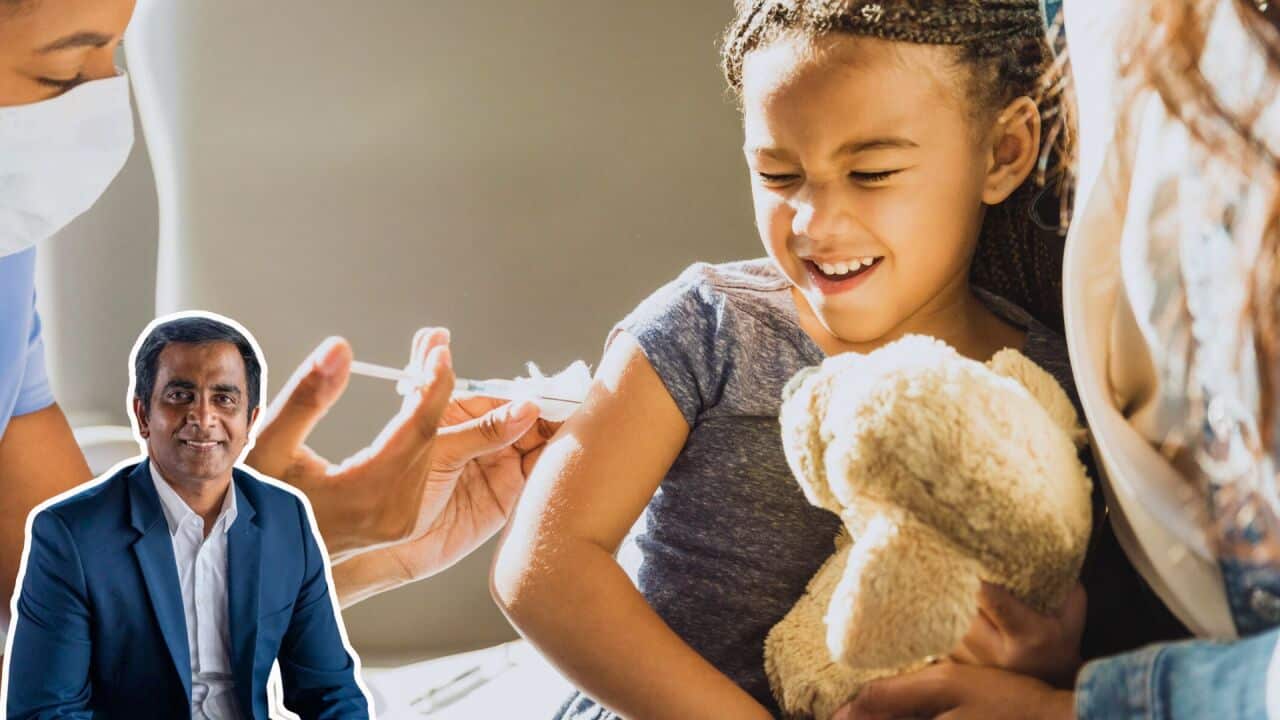 Upset little girl receives vaccine