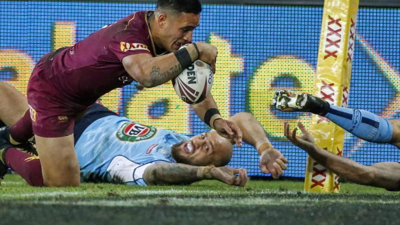 Valentine Holmes scores one of his three tries