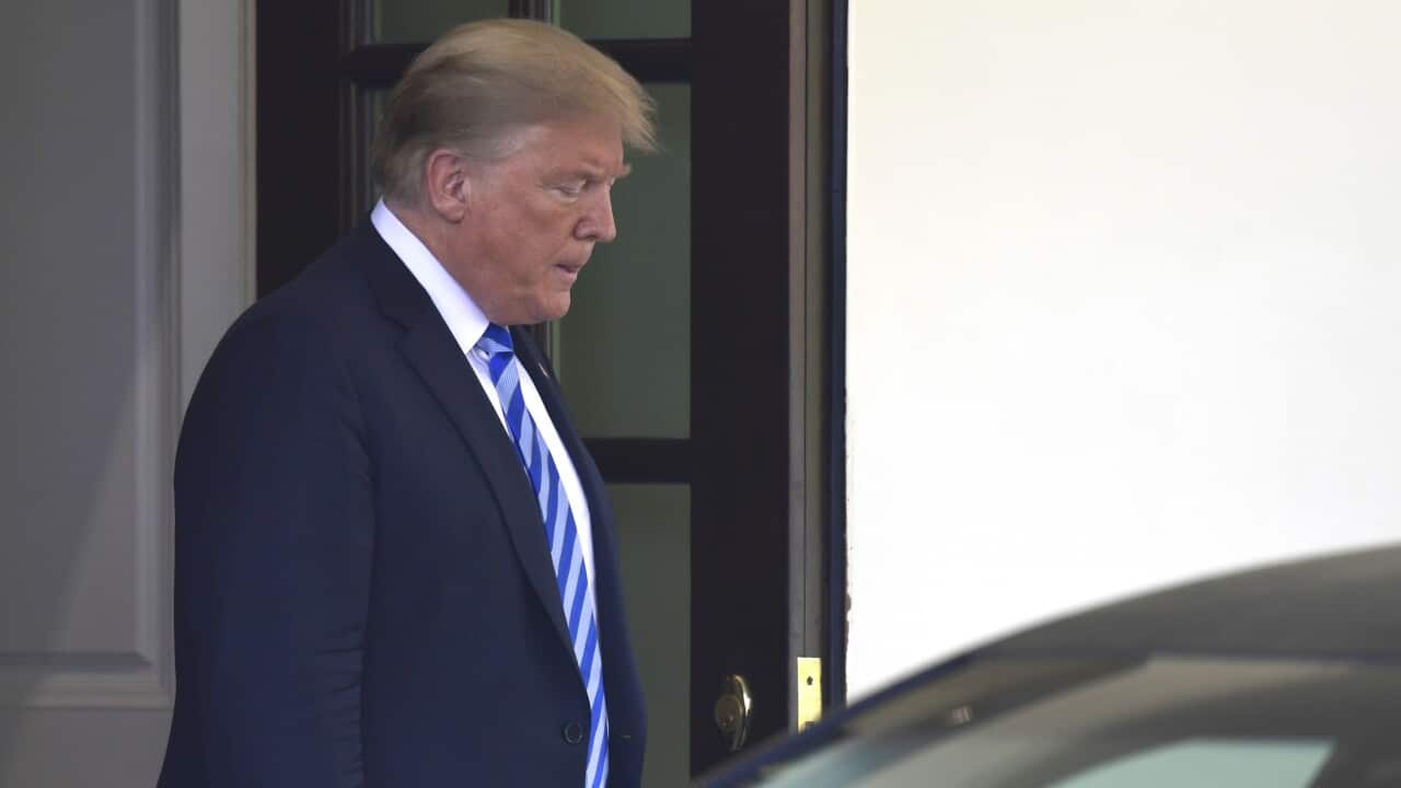 President Donald Trump waits to greet the Emir of Kuwait Sheikh Sabah Al Ahmad Al Sabah at the West Wing of the White House in Washington, Wednesday, Sept. 5, 2018. (AP Photo/Susan Walsh)