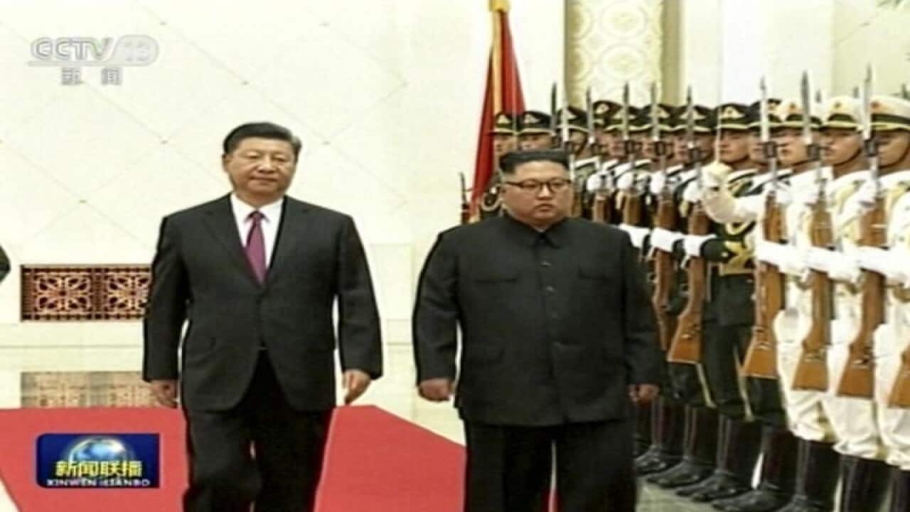 Chinese President Xi Jinping with North Korean leader Kim Jong-un