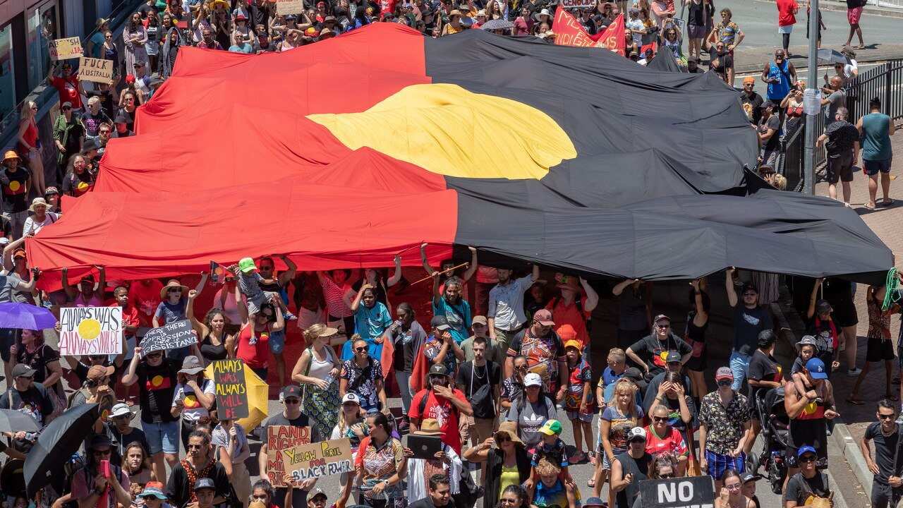 Invasion Day protesters are seen during the Australia Day celebrations in Brisbane.