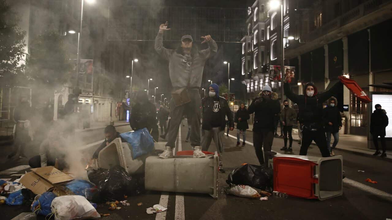 Protesters block the Gran Via street in Madrid, Spain.