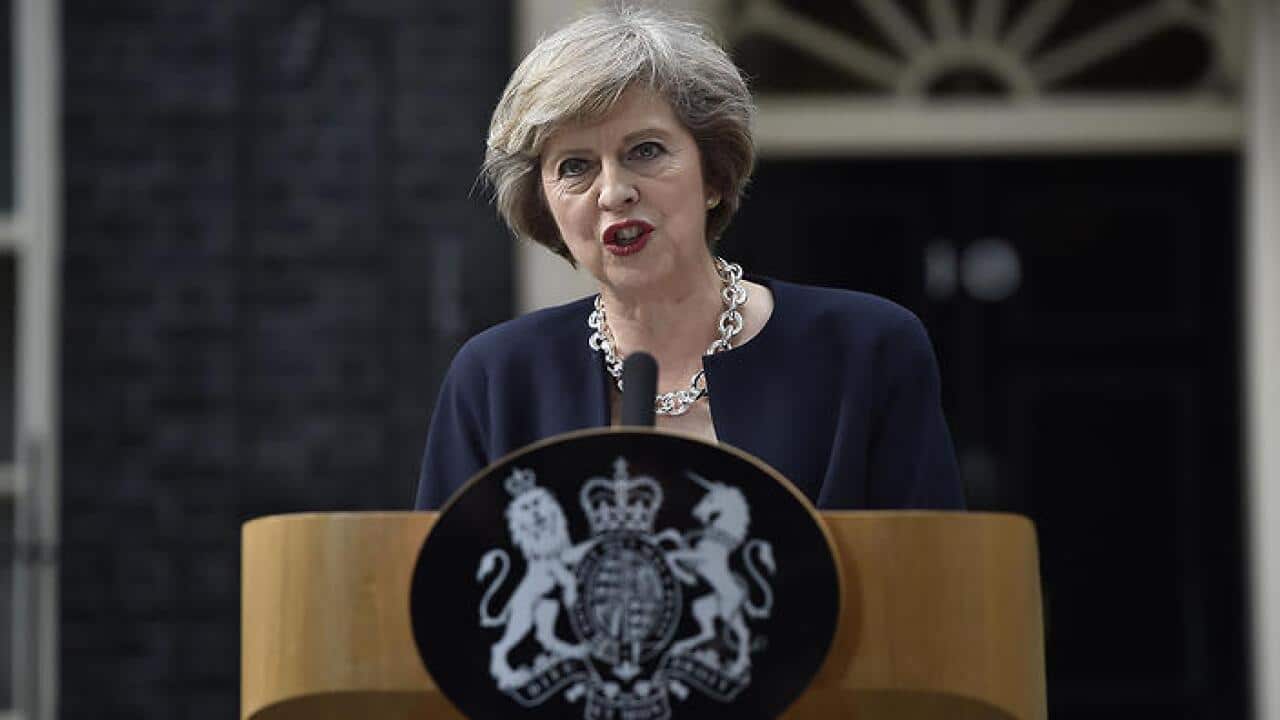 New Prime Minister Theresa May makes a speech outside 10 Downing Street, London, July 13, 2016. (AAP)