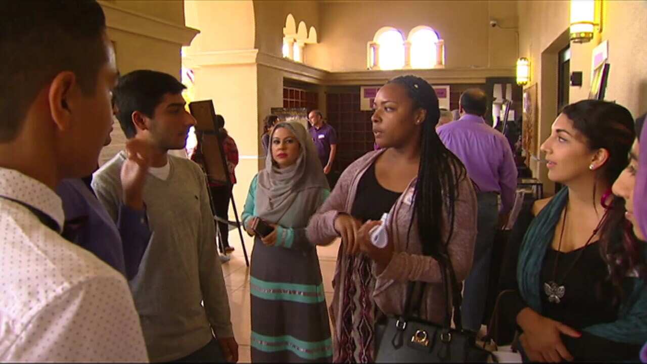 San Diego residents take part in the open mosque program at the Muslim Community Centre in San Diego, California.