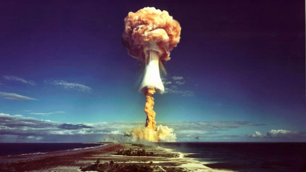 A mushroom cloud after the explosion of a French atomic bomb above the atoll of Mururoa, also known as Aopuni, in 1971.