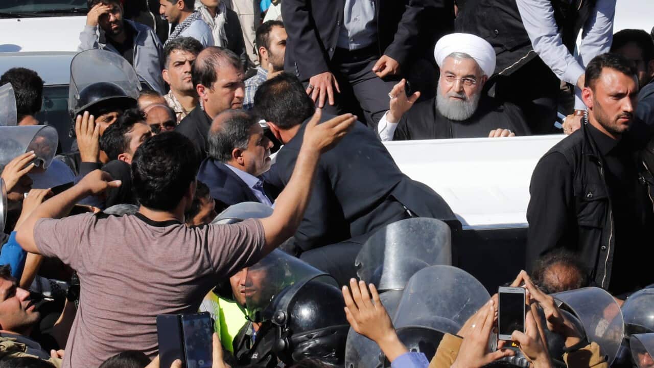 Iranian President Hassan Rouhani visits the earthquake site in the city of Sare Pole-Zahab in the Kermanshah province, Iran, 14 November 2017.