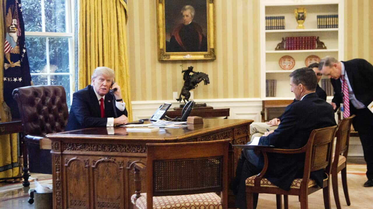 Donald Trump, left, with National Security Adviser Michael Flynn