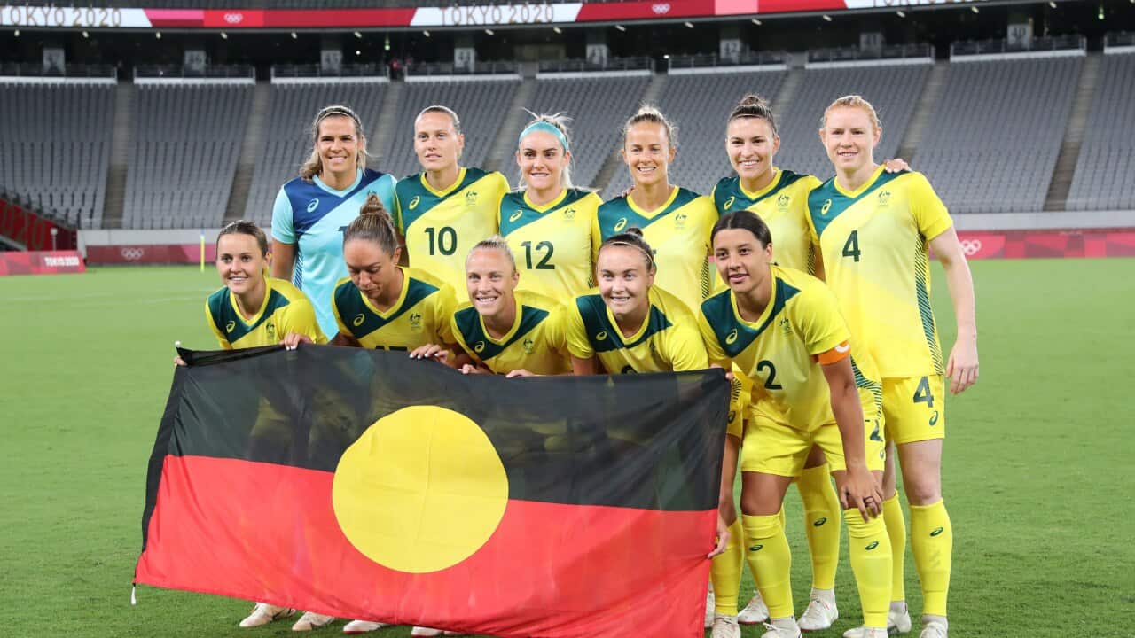 Matildas with Aboriginal Flag at Olympics