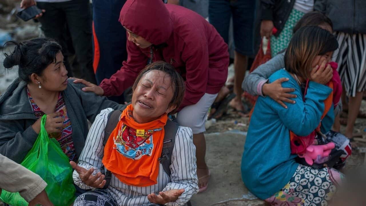 The death toll in Indonesia's twin quake-tsunami disaster has passed 1,400.