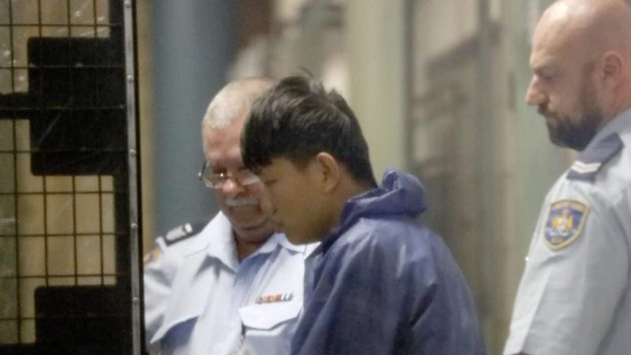 Shuo Dong led to a prison van (file image)
