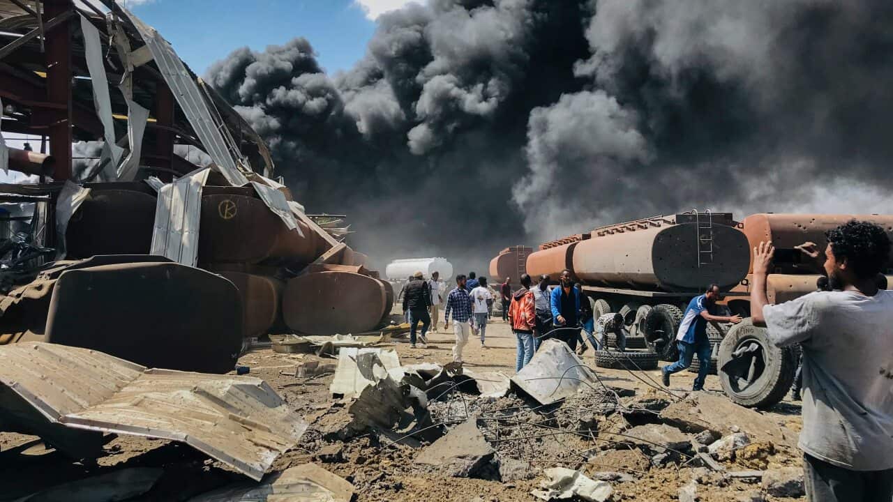 Clouds of black smoke from fires in the aftermath of an airstrike in Mekele, the capital of the Tigray region of northern Ethiopia on 20 October, 2021.
