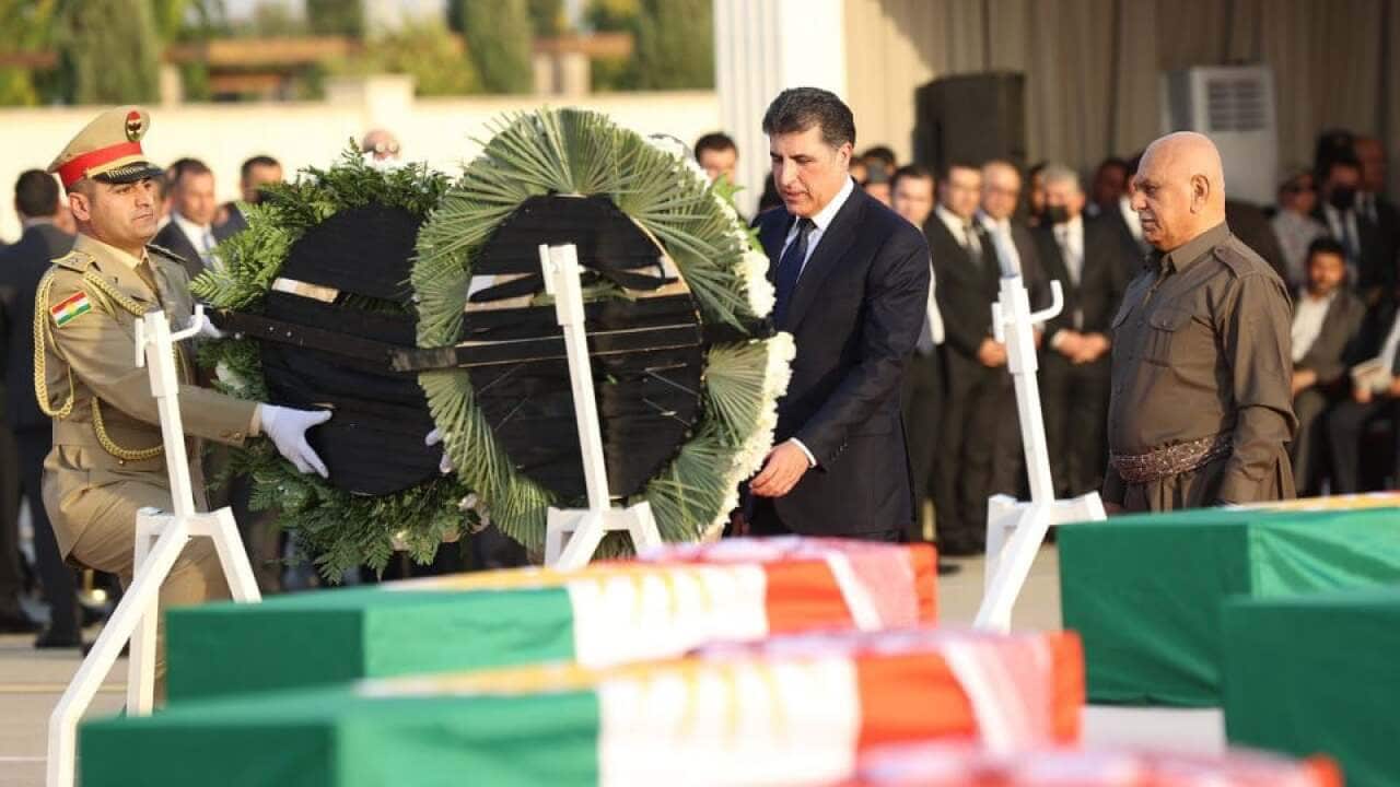 President of KRG N. Barazani laying wreath on Anfal victims